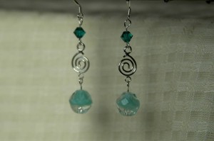 clear-and-teal-swirly-drops
